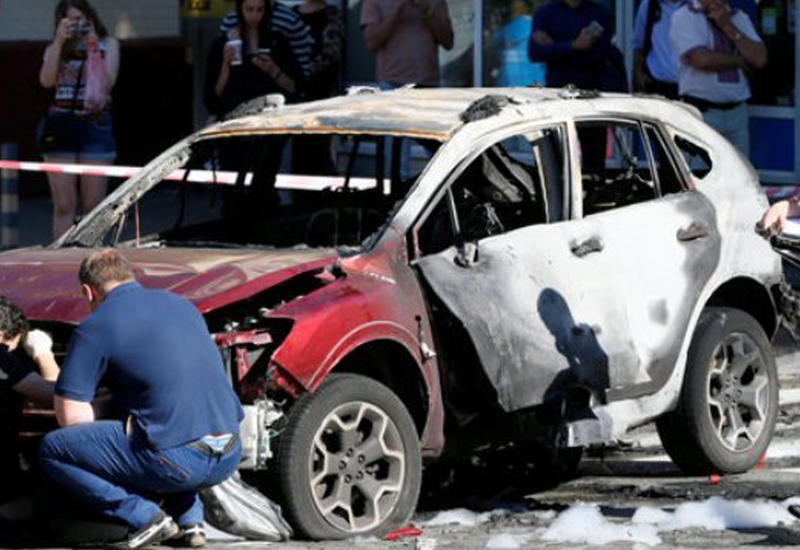 Момент закладки взрывчатки под машину Шеремета попал на камеры