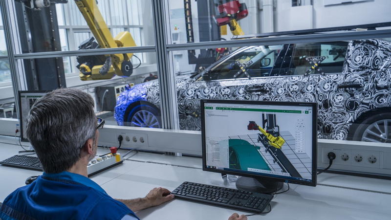 Роботы BMW научились создавать трехмерную модель новой "пятерки"