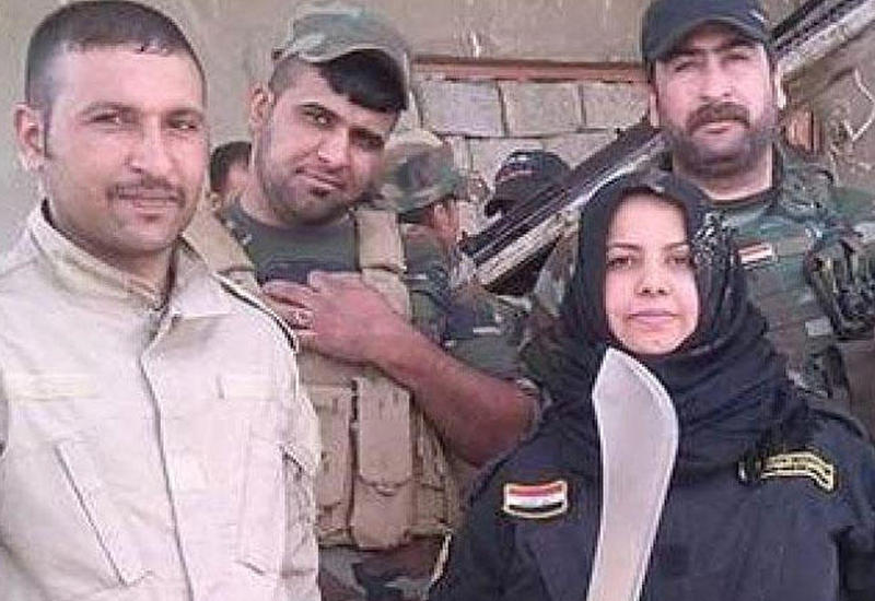"Evdar xanım" terrorçuların başını kəsdi, bişirdi