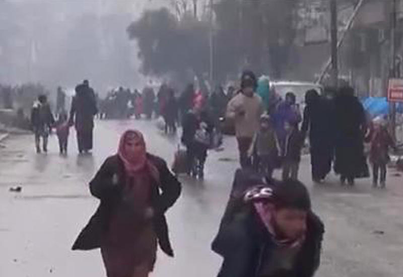 Появились кадры операции по выводу семей боевиков из Алеппо