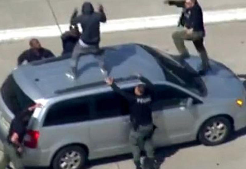 Забавный захват преступника полицией Детройта попал на камеры