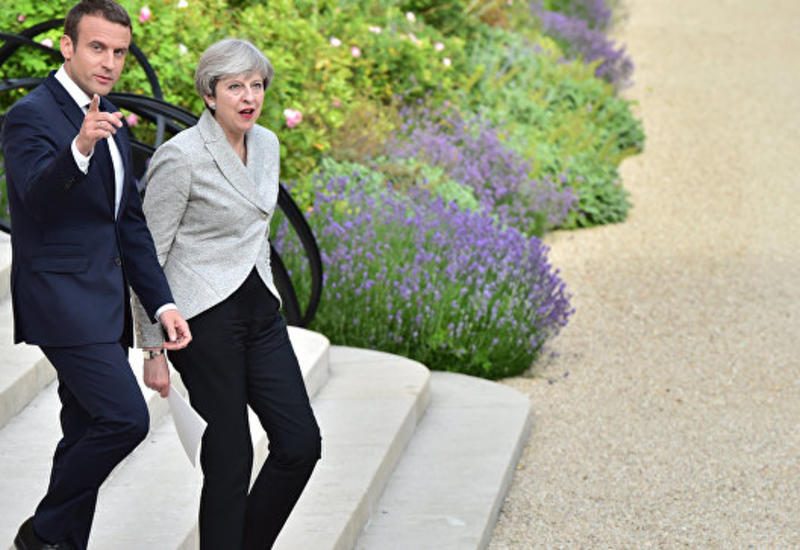 Мэй и Макрон договорились по соглашению с Ираном