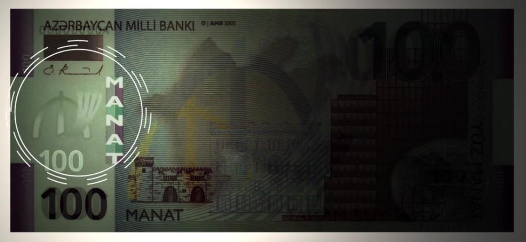 100 manatlıq əskinasın üzərindəki yazının mənası nədir? Saxta yüzlüyü bu üsulla ayırın
