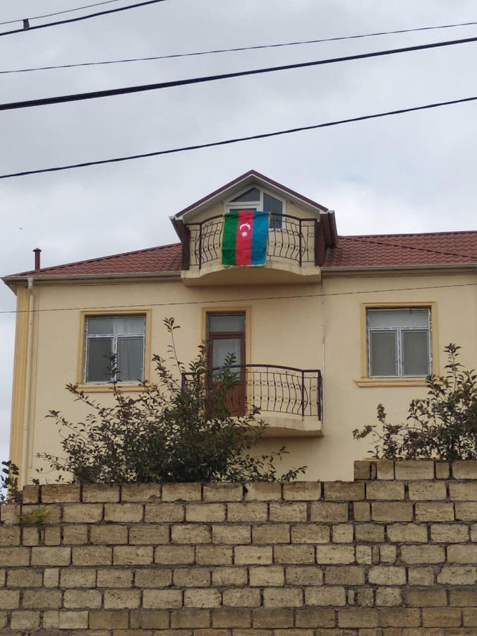 В Азербайджане проходит акция, посвященная государственному флагу