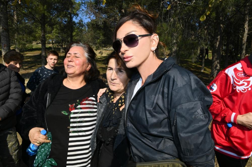 Президент Ильхам Алиев и Первая леди Мехрибан Алиева приняли участие в акции по посадке деревьев в Хатаинском районе Баку