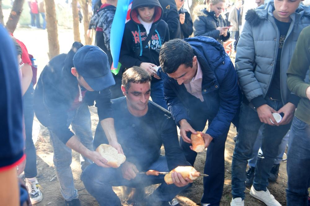 Президент Ильхам Алиев и Первая леди Мехрибан Алиева приняли участие в акции по посадке деревьев в Хатаинском районе Баку