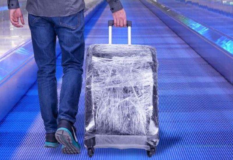 Почему не стоит обматывать чемодан пленкой?