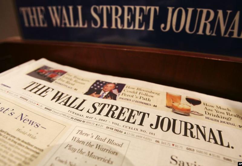 Китай аннулировал аккредитацию троих журналистов Wall Street Journal
