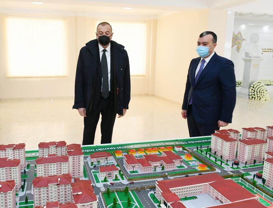 Президент Ильхам Алиев принял участие в церемонии предоставления квартир семьям шехидов и инвалидам войны в бакинском поселке Рамана
