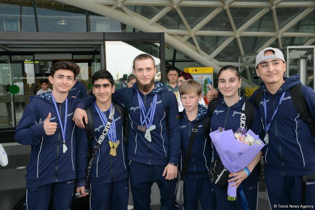 Азербайджанские гимнасты привезли в Баку из Италии медали Чемпионата Европы