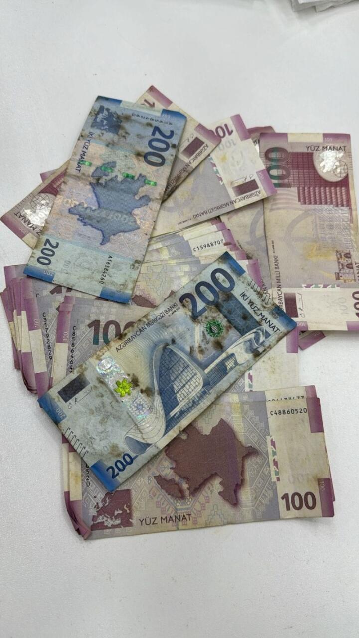Bakıda qadın illərdir pul yığdığı bankanın ağzın açanda