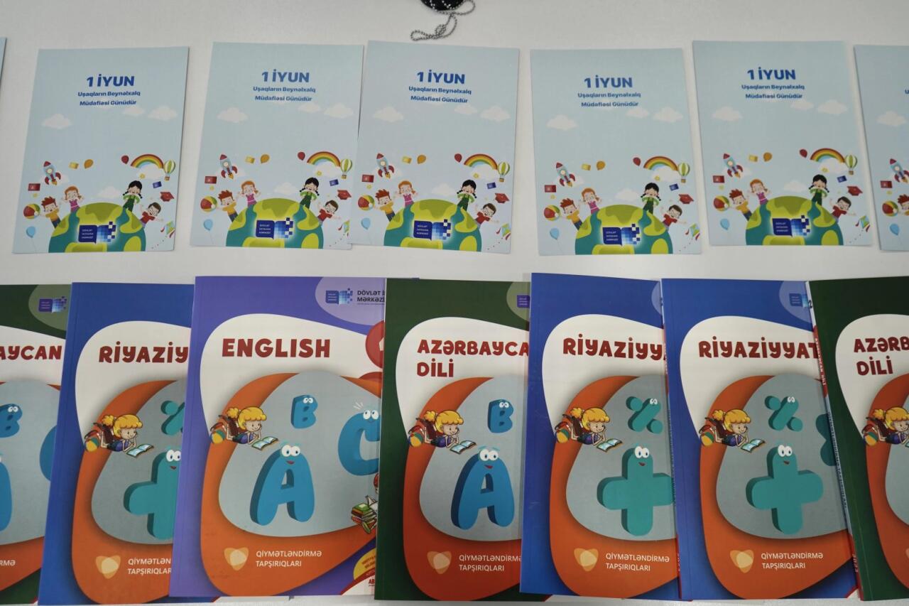 DİM şəhid övladlarına qiymətləndirmə kitabçalarını hədiyyə edib