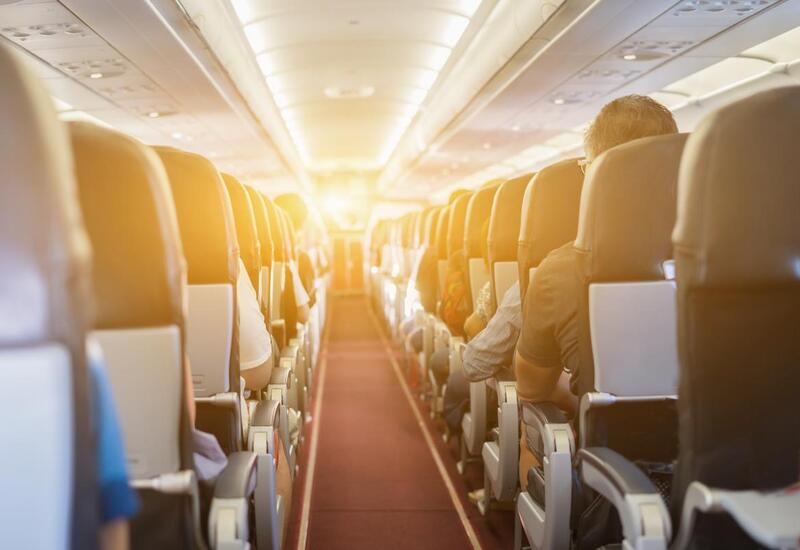 Təyyarədə sərnişini oturacağa bağladılar