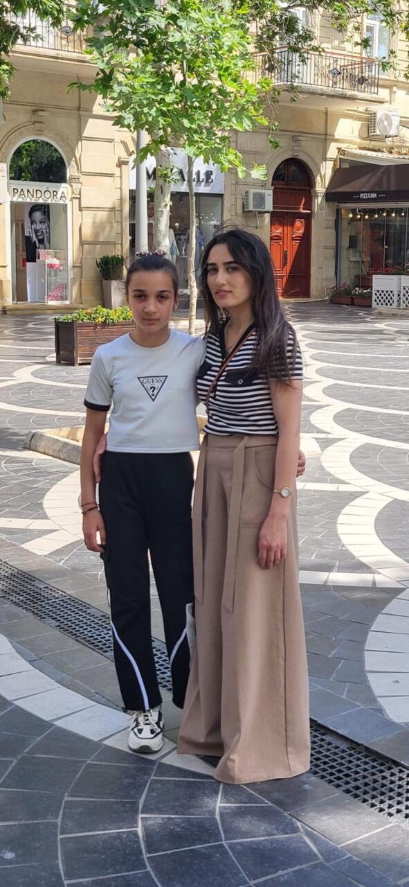 Üç uşaq anası 31 yaşında attestat aldı