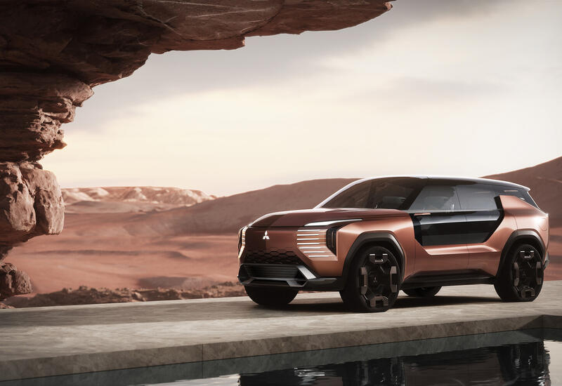 Mitsubishi рассекретила кроссовер с двухспальной кроватью в прицепе