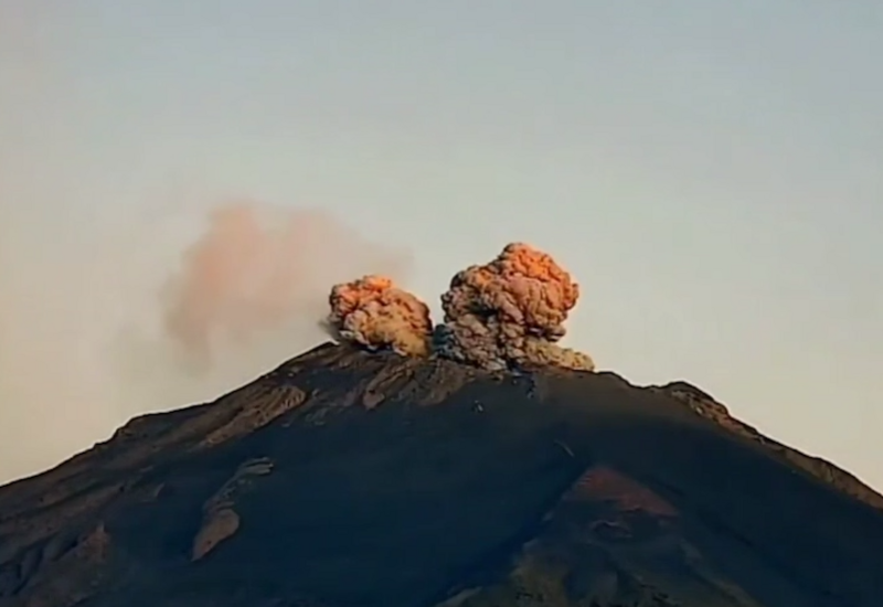 Оранжевый рассвет над Мехико