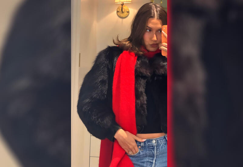 Жена Джастина Бибера в топе и укороченной шубе показала пресс