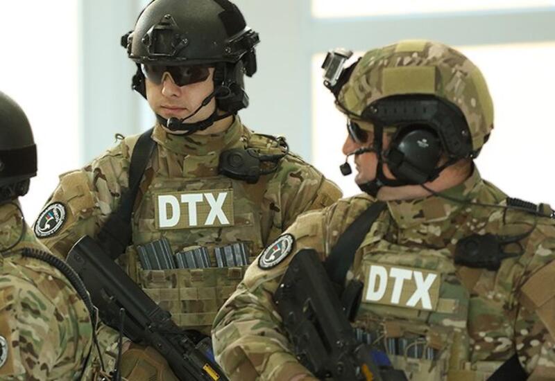 DTX xarici ölkəyə işləyən silahlı şəxsi saxlayıb