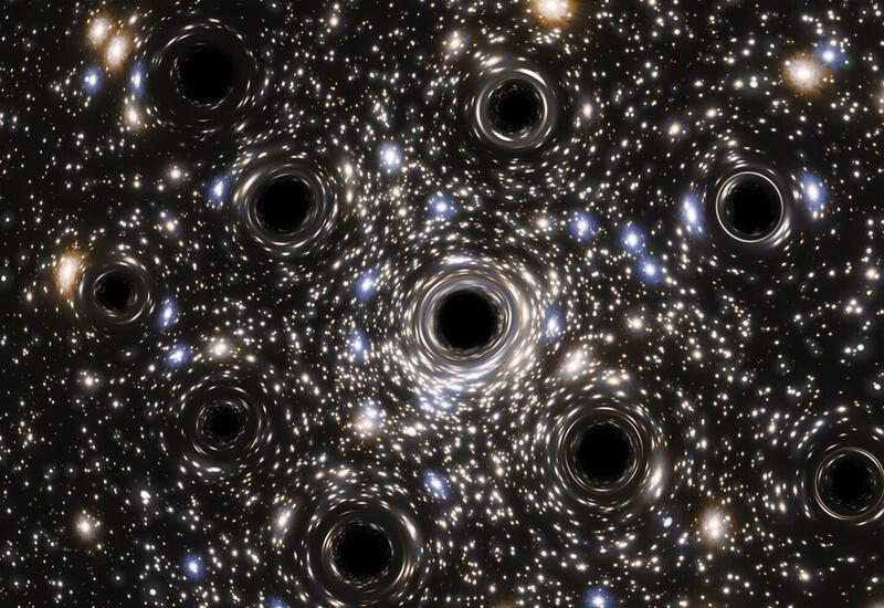 Ученый рассказал, как столкновение двух черных дыр повлияет на Землю