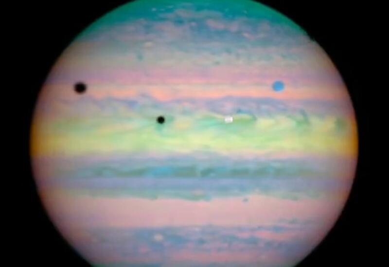 Хаббл зафиксировал редкое тройное затмение спутников Юпитера