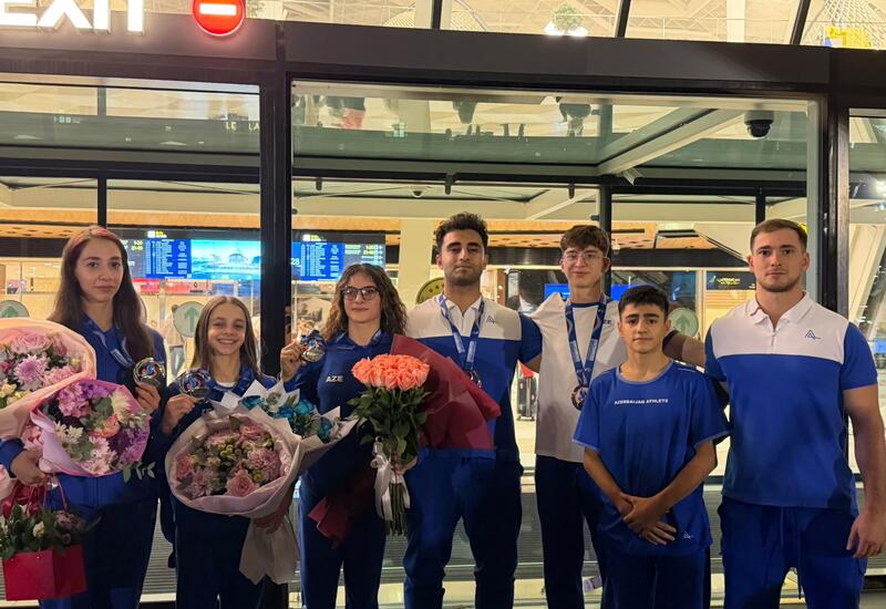 Призеры чемпионата мира по акробатической гимнастике вернулись в Азербайджан
