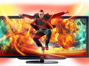 Philips проецирует фоновое изображение на стену за телевизором