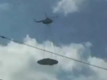 Российский военный вертолет перевозит НЛО? - ВИДЕО